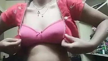 Indian Girl Wears Pink Bra And Red Top On Camera In Her Bedroom indian sex  video