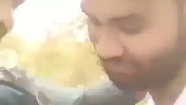 Indian outdoor sex of a guy sucking his GF’s tight boobs